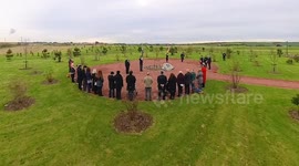 Remembrance service Royal British Legion Centenary woodland at Skol Nansledan Newquay Cornwall UK