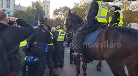 Counter-protesters clash with police as pro-Palestine march continues in London