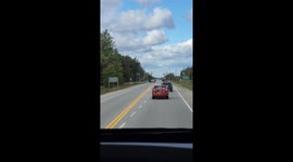 Car Uses Left Turn Lanes To Cut Traffic