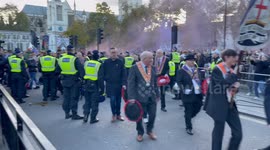 Violence emerges on Whitehall as far right protesters clash with police after they attempted to follow Orange Order marches through a police cordon to the Cenotaph police officers. used batons and formed lines while protesters threw bottles traffic cones