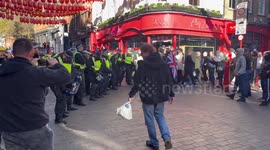 Tommy Robinson leads protesters on a march around Chinatown in UK