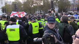 Violent clashes between Remembrance Day protesters and police outside Whitehall in London