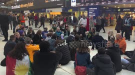 Pro-Palestine protesters stage a sit-in at London Waterloo station on Armistice Day