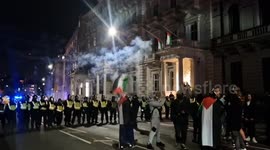 Pro-Palestine protesters shoot fireworks at police after being kettled in Victoria