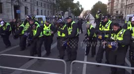 Counter-protesters clash with police in Parliament Square on Armistice Day in London, UK