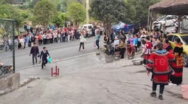Ethnic tribes enjoy water splashing ceremony at wedding in China