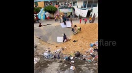 Children Play In Bomb Crater in Gaza