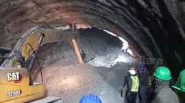 Race to rescue 40 workers after tunnel collapses in northern India