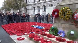 Visitors pay respects to fallen heroes at the Cenotaph after the National Service of Remembrance 2023
