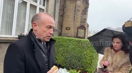 Northern Ireland Secretary speaks to the media after Remembrance service in Enniskillen , UK