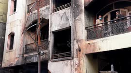 Nine dead in Hyderabad building fire sparked by car repair beside stored chemical drums