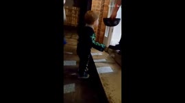 Toddler wants the whole bowl of candies on his first trick-or-treat adventure