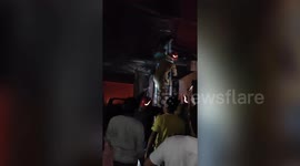 Officials rescue residents after blaze engulfs residential building in northern India