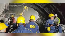 Officials assure workers of rescue after they got trapped as under-construction tunnel collapsed in northern India