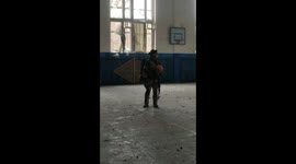 Ukrainian soldiers find joy amidst conflict: basketball break in abandoned gym near demarcation line