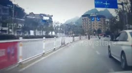 Careless motorcycle rider fails to notice son falling from seat
