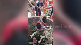Two men saved from 15m-deep well by rescue officials in northern India