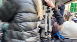 Greta Thunberg mobbed by press as she leaves court in London