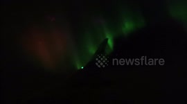 Aurora borealis seen from the airplane in the skies of Finland during November.