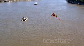 Andy Nation swims under Hammersmith Bridge on his way to Calais