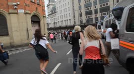 People Run To See The Royal Couples Car Depart