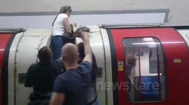 Terrified passengers flee London Underground train at Holland Park as it starts to fill up with smoke