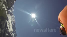 Wingsuit base jump douggs hand cam angle