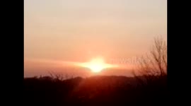 Hot Orange Sun Set over the hills