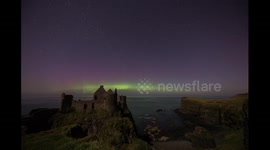 St Patricks Day Northern Lights above Irish castle