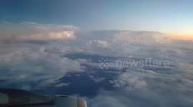 Lightning in the clouds, filmed from a plane