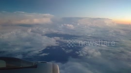 Lightning in the clouds, filmed from a plane