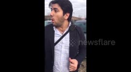 Member of staff at Brussels airport informs traveller of explosions