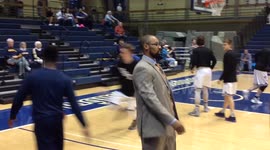 College basketball coach has different handshake for every player