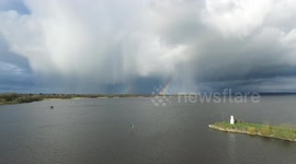 Amazing footage of hail storm and rainbow