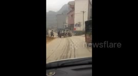 Mini tractor does doughnuts after losing driver