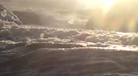 Sea foam bubbles off the coast of Cornwall, UK