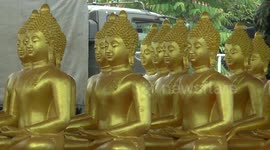 Dozens of stunning Buddha statues transported in Thailand