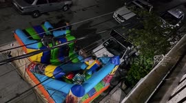 Failed jump attempt: slippery inflatable mishap in State of Mexico caught on camera