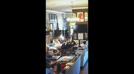 Table Collapses Under Tattoo Artist