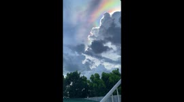 Beautiful fire rainbow appears above homes in the Philippines