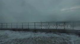 Huge waves pummel St Ives seafront after night of torrential rain and strong winds