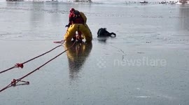 Firefighters save woman trapped on cracked frozen river in China after accidental fall