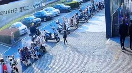 Girl narrowly misses collision with passing car in eastern China