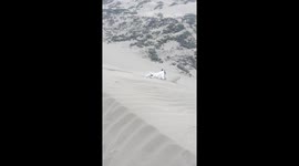 Bambam's joyful sand dune adventures in Aucallama, Peru