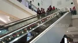 Polite shoppers calmly queue for the exits as Philippines earthquake shakes mall