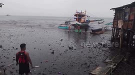 Tide surges toward seaside homes following powerful Philippines earthquake