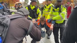 Police arrest Just Stop Oil activists as they march in Central London