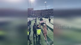 Harvard-Yale game interrupted by nude PETA activists protesting against baby monkey experiments