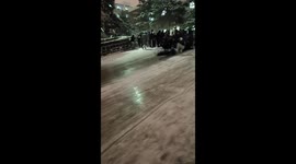 Students slide down freezing hillside amid winter chill in China