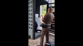 Stuck stray dog with head poking through wall rescued